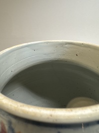 A Chinese wucai 'phoenixes and peonies scroll' vase, Transitional period