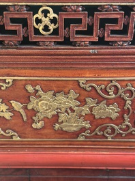 A large and fine Chinese gilt-red-lacquered cabinet with figures and antiquities, 19th C.