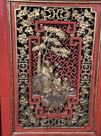 A large and fine Chinese gilt-red-lacquered cabinet with figures and antiquities, 19th C.