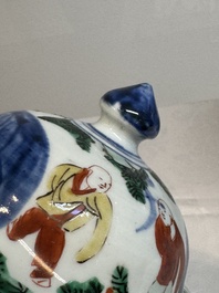 A pair of Chinese wucai vases and covers with court ladies and playing boys, Transitional period