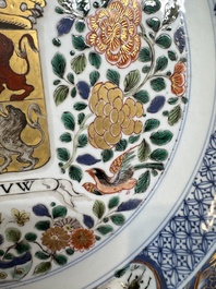 A large Chinese famille verte armorial 'Provinces' dish with the arms of Henegouw, Kangxi