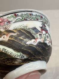 A Chinese famille rose and grisaille 'mountainous landscape' cup and saucer, Yongzheng
