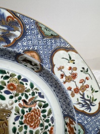 A large Chinese famille verte armorial 'Provinces' dish with the arms of Henegouw, Kangxi