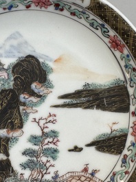 A Chinese famille rose and grisaille 'mountainous landscape' cup and saucer, Yongzheng