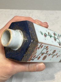 A pair of Chinese famille verte hexagonal tea caddies and covers with floral design, Kangxi