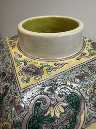 A pair of Chinese verte biscuit covered square jars on wooden stand, 19th C.