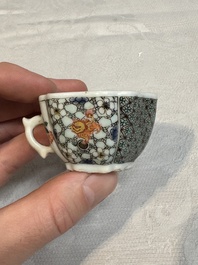 Two small Chinese famille verte handled cups with 'prunus on cracked ice' and 'shou' design, Kangxi