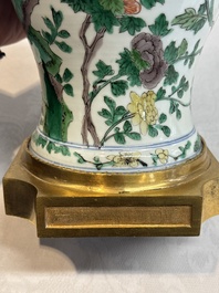 A Chinese famille verte gilt-bronze-mounted 'yenyen' vase with pheasants among flowering branches, Kangxi