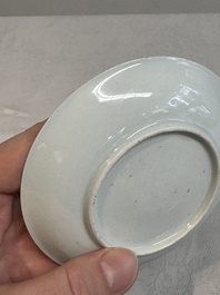 A Chinese famille rose and grisaille 'mountainous landscape' cup and saucer, Yongzheng