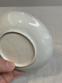 A Chinese famille rose and grisaille 'mountainous landscape' cup and saucer, Yongzheng
