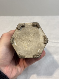 A pair of Chinese famille verte hexagonal tea caddies and covers with floral design, Kangxi