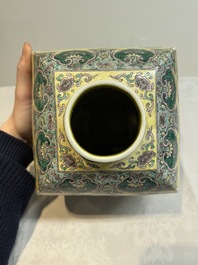 A pair of Chinese verte biscuit covered square jars on wooden stand, 19th C.