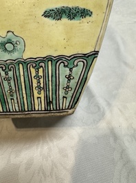 A pair of Chinese verte biscuit covered square jars on wooden stand, 19th C.