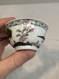 A Chinese famille rose and grisaille 'mountainous landscape' cup and saucer, Yongzheng