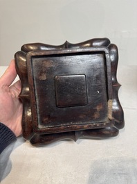 A pair of Chinese verte biscuit covered square jars on wooden stand, 19th C.