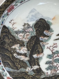 A Chinese famille rose and grisaille 'mountainous landscape' cup and saucer, Yongzheng