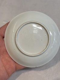 A Chinese famille rose and grisaille 'mountainous landscape' cup and saucer, Yongzheng