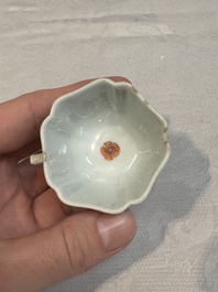 Two small Chinese famille verte handled cups with 'prunus on cracked ice' and 'shou' design, Kangxi