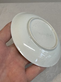 A Chinese famille rose and grisaille 'mountainous landscape' cup and saucer, Yongzheng