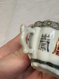 Two small Chinese famille verte handled cups with 'prunus on cracked ice' and 'shou' design, Kangxi