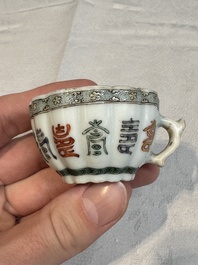 Two small Chinese famille verte handled cups with 'prunus on cracked ice' and 'shou' design, Kangxi