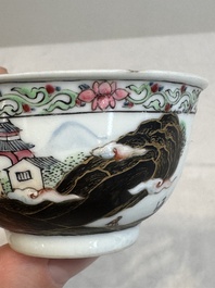 A Chinese famille rose and grisaille 'mountainous landscape' cup and saucer, Yongzheng