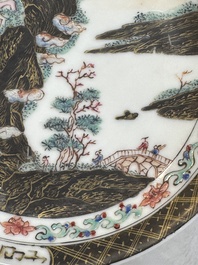 A Chinese famille rose and grisaille 'mountainous landscape' cup and saucer, Yongzheng