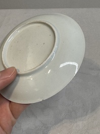 A Chinese famille rose and grisaille 'mountainous landscape' cup and saucer, Yongzheng