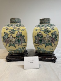 A pair of Chinese verte biscuit covered square jars on wooden stand, 19th C.