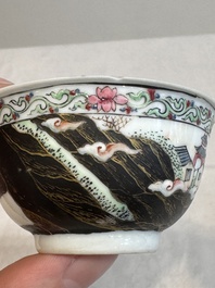A Chinese famille rose and grisaille 'mountainous landscape' cup and saucer, Yongzheng
