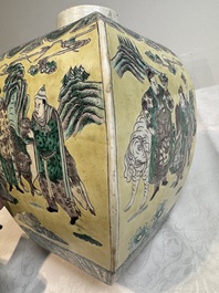 A pair of Chinese verte biscuit covered square jars on wooden stand, 19th C.