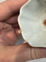 Two small Chinese famille verte handled cups with 'prunus on cracked ice' and 'shou' design, Kangxi