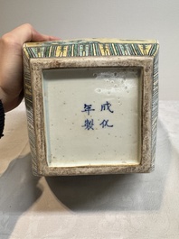 A pair of Chinese verte biscuit covered square jars on wooden stand, 19th C.