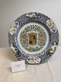A large Chinese famille verte armorial 'Provinces' dish with the arms of Henegouw, Kangxi