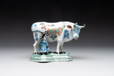 A pair of unusual polychrome Dutch Delft milking groups, 18th C.