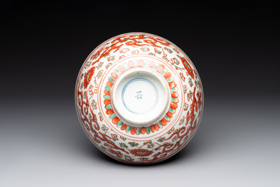 A Chinese wucai 'dragon and phoenix' bowl, Shi 石 mark, Transitional period