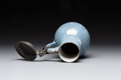 A monochrome blue Brussels faience pewter-mounted jug, 18th C.