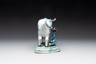A pair of unusual polychrome Dutch Delft milking groups, 18th C.