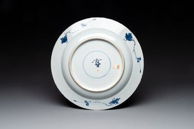 A Chinese blue and white armorial dish with the arms of Pelgrom for the Dutch market, Kangxi