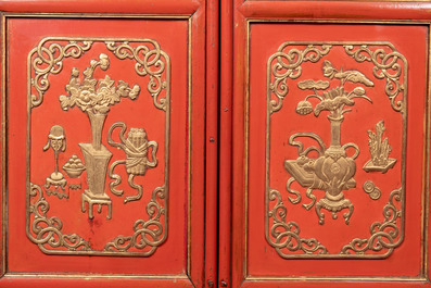 A large and fine Chinese gilt-red-lacquered cabinet with figures and antiquities, 19th C.