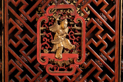 A large and fine Chinese gilt-red-lacquered cabinet with figures and antiquities, 19th C.