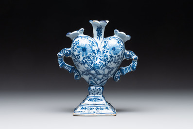 A pair of blue and white German Delftware heart-shaped tulip vases, 18th C.