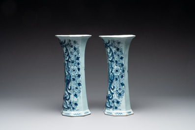 A large blue and white Dutch Delft garniture of five vases and covers, 2nd half 18th C.
