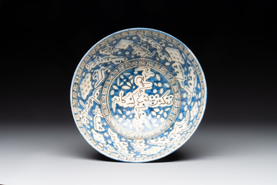 A polychrome pierced calligraphic bowl, Qajar, 19th C.