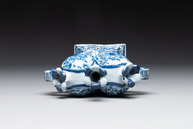 A pair of blue and white German Delftware heart-shaped tulip vases, 18th C.