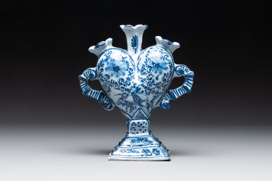A pair of blue and white German Delftware heart-shaped tulip vases, 18th C.