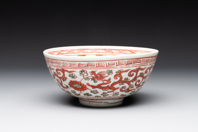 A Chinese wucai 'dragon and phoenix' bowl, Shi 石 mark, Transitional period