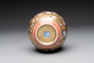 A Chinese gilt-ground famille rose vase with floral design, Qianlong mark and possibly of the period