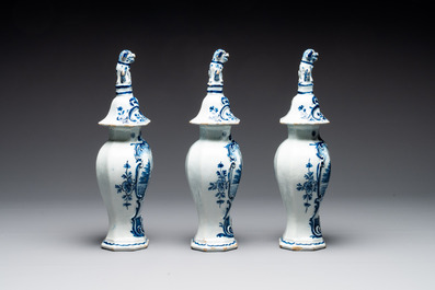 A blue and white Dutch Delft garniture of five vases and covers, 2nd half 18th C.