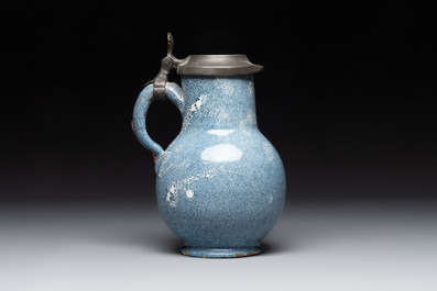 A monochrome blue Brussels faience pewter-mounted jug, 18th C.